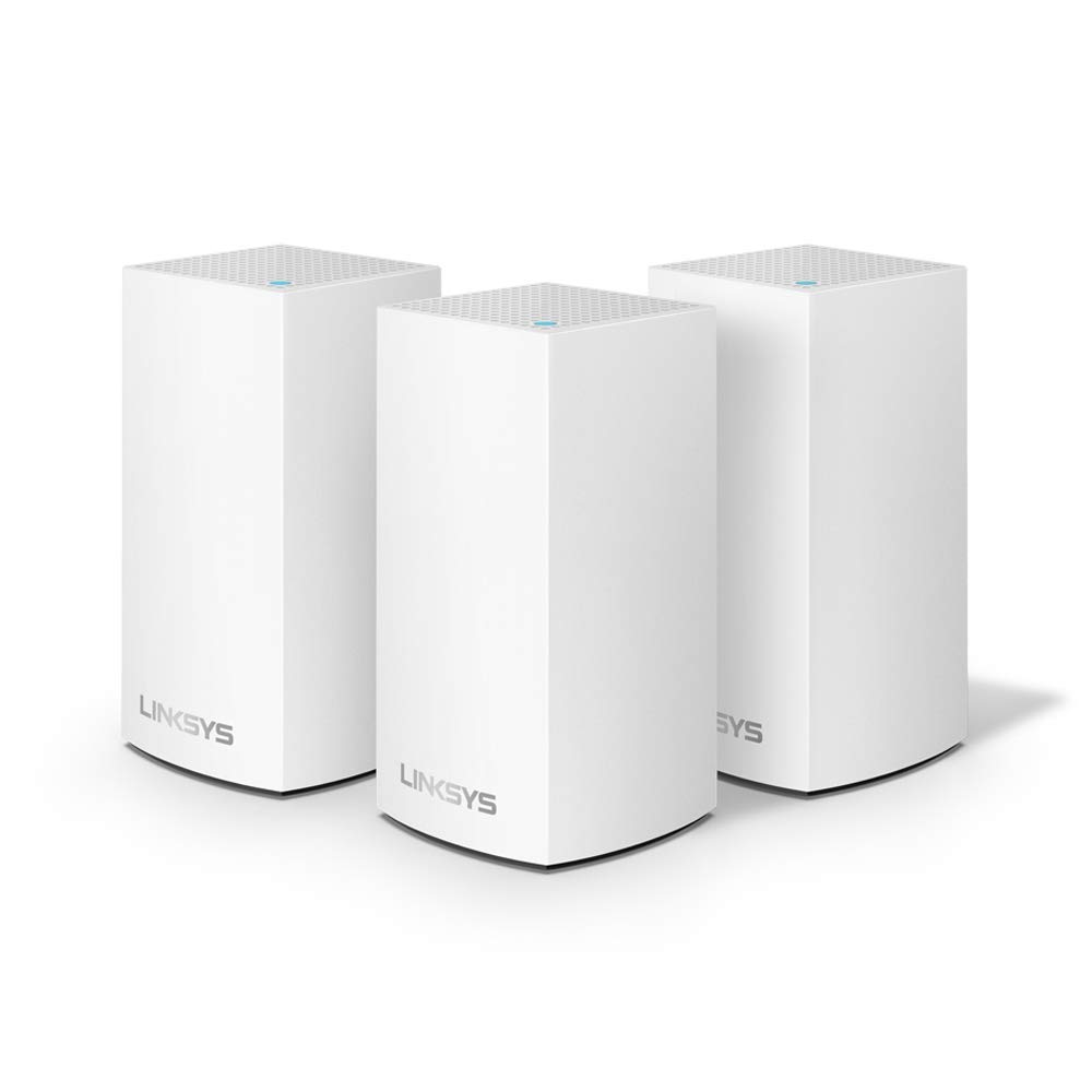 Sistema de tres nodos Linksys Velop, color blanco, dispuestos juntos.