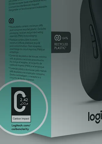 Mouse Logitech M190 junto a un port&aacute;til, ideal para el trabajo diario y productividad en movimiento