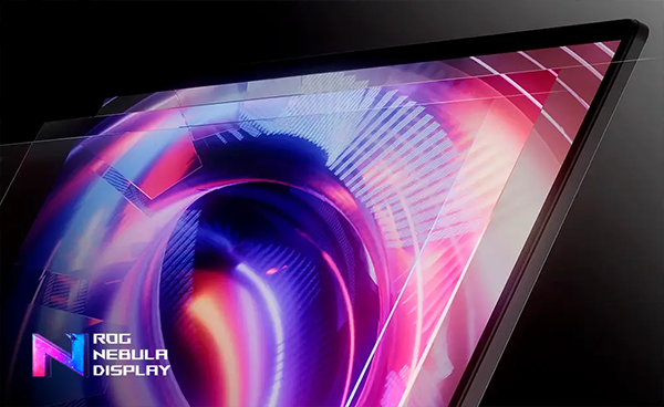 Vista en &aacute;ngulo del teclado del ROG Strix G16 con iluminaci&oacute;n RGB por tecla y el touchpad de gran precisi&oacute;n.